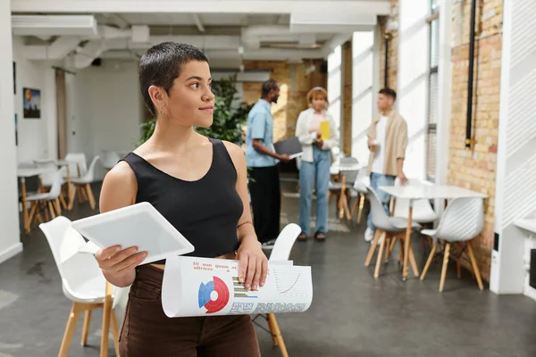 Happy and tattooed businesswoman holding digital tablet, startup, generation z, graphs, coworking — Stock Photo