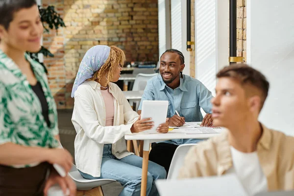 African american people discussing project, using tablet, coworking, start up, generation z, smile — Stock Photo