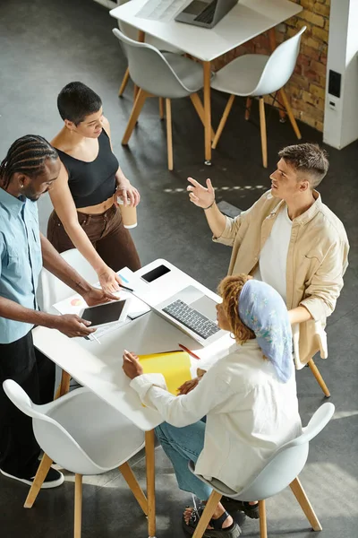 Coworking, open space, multicultural business people discussing startup project, generation z — Stock Photo
