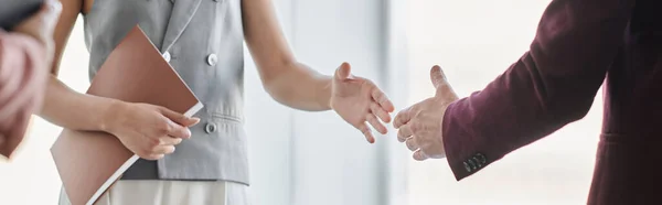 Partial view of successful business partners shaking hands in office, closing deal, banner — Stock Photo