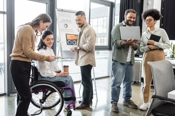 Diversity and inclusion, interracial startup team planning project with  disabled businesswoman — Stock Photo