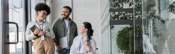 Group shot of interracial business people chatting during break time in office, diversity banner — Stock Photo