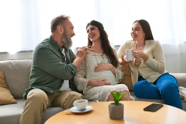 Father paid visit to his pregnant daughter and her partner, in vitro fertilization concept — Stock Photo
