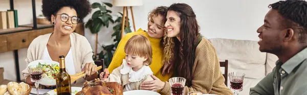 Multicultural friends or family members celebrating Thanksgiving together, roasted turkey, banner — Stock Photo