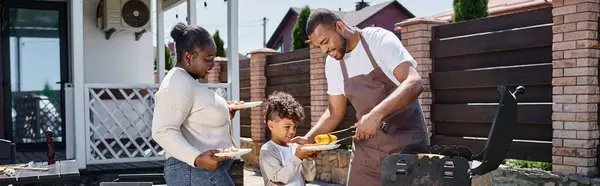 Happy african american man serving grilled corn on plate of son near wife during bbq party, banner — Stock Photo