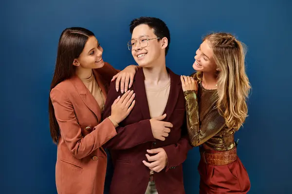 Cheerful adorable interracial teens in vivid clothes having great time together, friendship day — Stock Photo