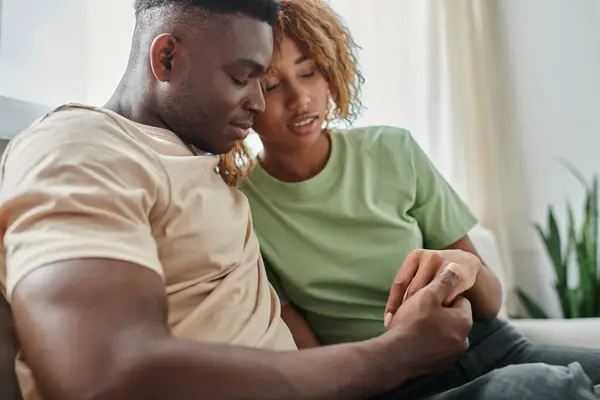 Tender moment between african american couple at home, bonding and closeness between man and woman — Stock Photo