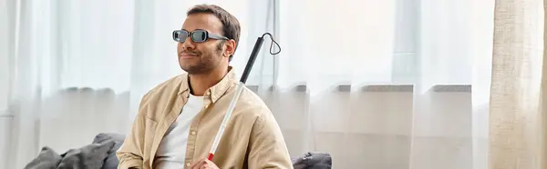 Cheerful indian man with visual impairment in casual outfit with glasses and walking stick, banner — Stock Photo