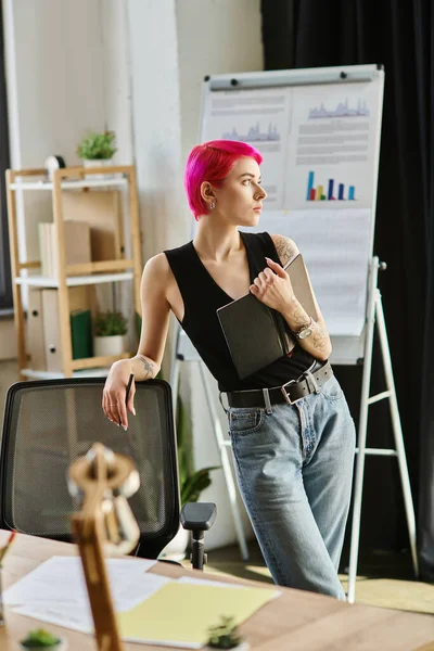 Attractive thoughtful businesswoman in urban attire with notes looking away with charts on backdrop — Stock Photo