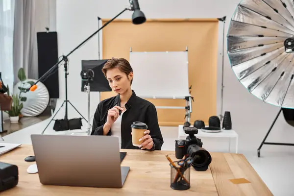 Gorgeous professional female designer in casual attire working with her drawing tablet in studio — Stock Photo
