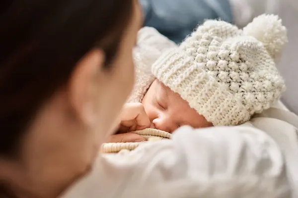 Good looking woman in cozy casual attire breastfeeding her cute newborn child, modern parenting — Stock Photo