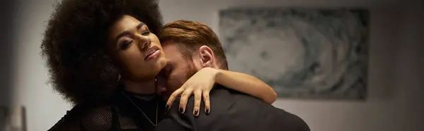 Bearded man seducing pretty african american woman with curly hair, banner of sexy couple — Stock Photo