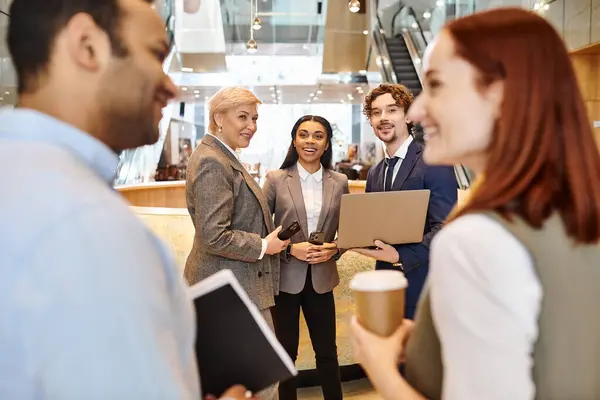 A diverse group of business people working together in a circle. — Stock Photo