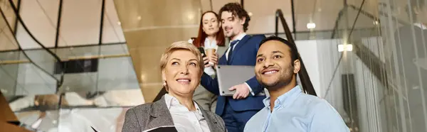 A diverse group of business people standing together in unity. — Stock Photo