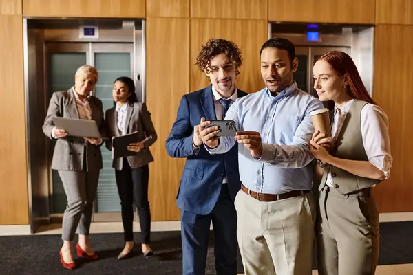 A diverse group of business professionals standing together in a circle. — Stock Photo