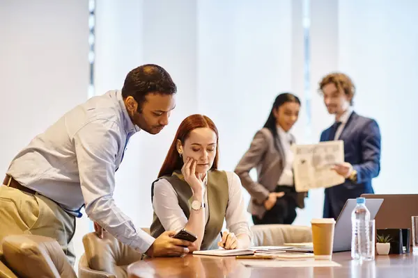 Diverse business team collaborating around a table. — Stock Photo