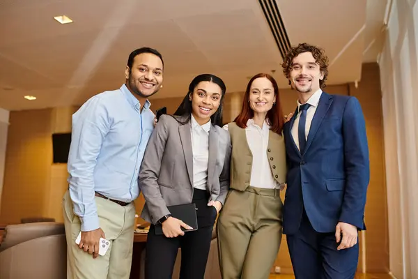 A multinational group of business professionals standing together in unity. — Stock Photo