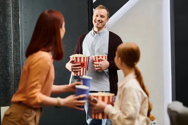 A joyful family stands in a circle, connecting with each other with smiles and laughter. — Stock Photo