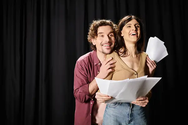 A handsome man and a beautiful woman practicing for a theater performance. — Stock Photo