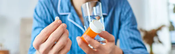 A Man gracefully taking pills. — Stock Photo