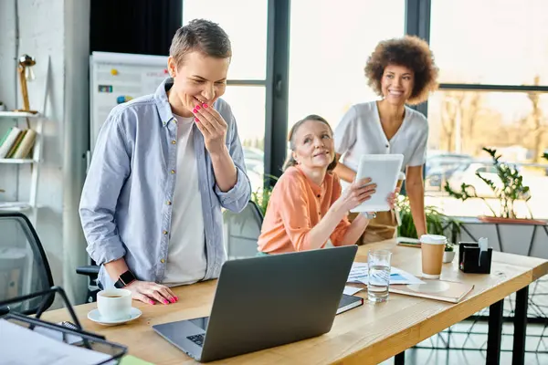 Attractive diverse group of businesswomen collaborating in their office. — Stock Photo