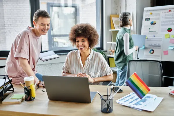 Attractive diverse female professionals working together on their project in office. — Stock Photo
