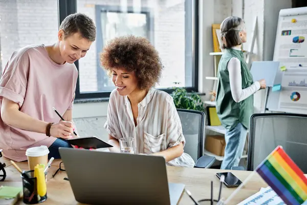 Beautiful diverse female professionals working together on their project in office. — Stock Photo