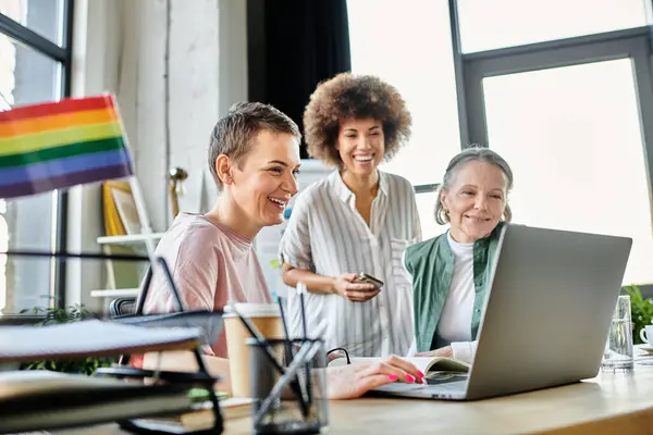 Motivated diverse businesswomen discussing ideas at desk in modern office. — Stock Photo