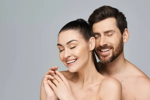 Attractive couple beaming with joy. — Stock Photo