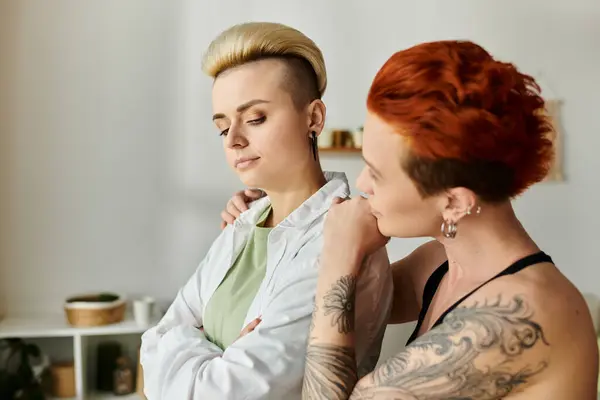 Two passionately inked women stand together, showcasing their stunning tattoos and shared bond. — Stock Photo