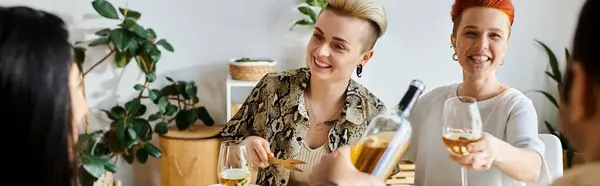 Diverse women enjoying wine together at a table. — Stock Photo