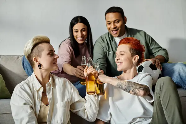 Diverse group enjoying cozy time on sofa. — Stock Photo