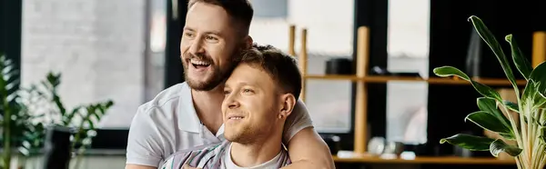 A man giving a heartfelt hug to another man. — Stock Photo