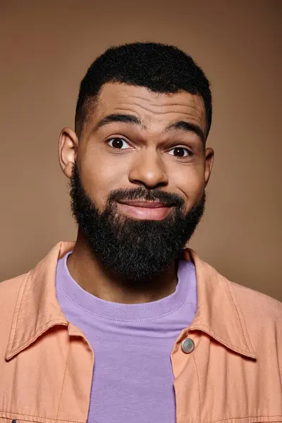 Close-up of stylish African American man with beard in vibrant setting. — Stock Photo