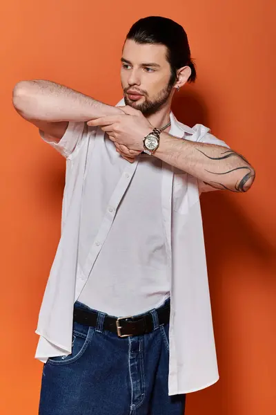 Stylish Caucasian man posing actively. — Stock Photo