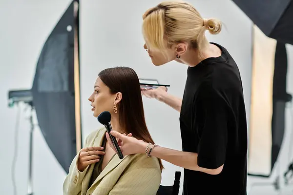 Attractive woman receives a stylish makeover from a talented male stylist. — Stock Photo