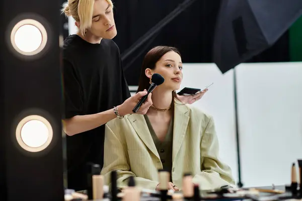 Professional stylist creating a new look for a woman. — Stock Photo