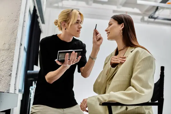 Young woman receives a stylish makeover from a talented male stylist. — Stock Photo