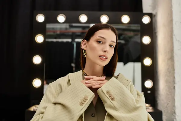 Woman admiring makeup next to mirror. — Stock Photo