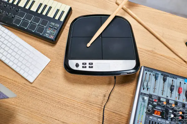 Close-up of a digital drum pad in a music studio setting. — Stock Photo