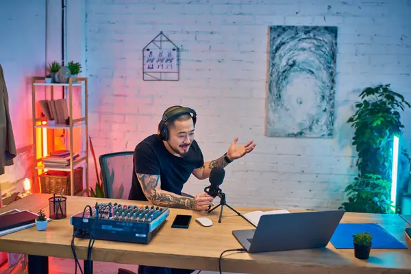 A man records his podcast in his home studio. — Stock Photo