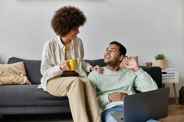 A young African American couple communicates through sign language while enjoying a relaxing moment at home. — Stock Photo