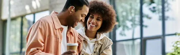 A couple in love taking walk outside and smiling at each other. — Stock Photo