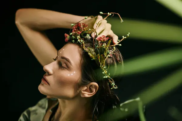 A woman wearing a floral crown poses near a swamp. — Stock Photo