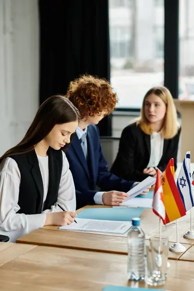 Teenagers participate in a UN Model conference, engaging in diplomatic discussions and negotiations. — Stock Photo
