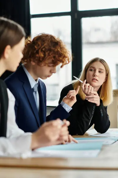Teenagers participate in a UN Model conference, engaging in diplomatic discussion. — Stock Photo