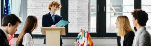 Teenagers participate in a lively discussion at a Model United Nations event. — Stock Photo