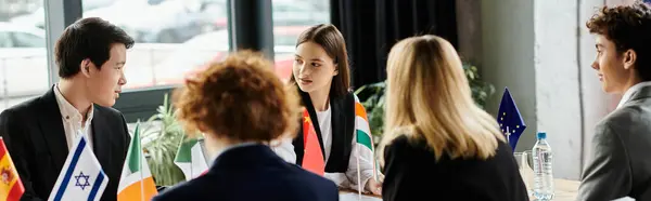 Teens in Model UN engage in global talks, representing various nations. — Stock Photo
