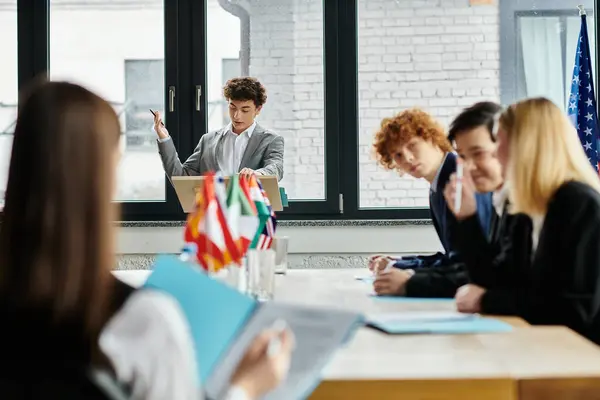 Teenagers participate in a Model UN conference, engaging in discussion and debate. — Stock Photo