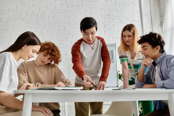 A group of teenagers work together at a UN model conference. — Stock Photo